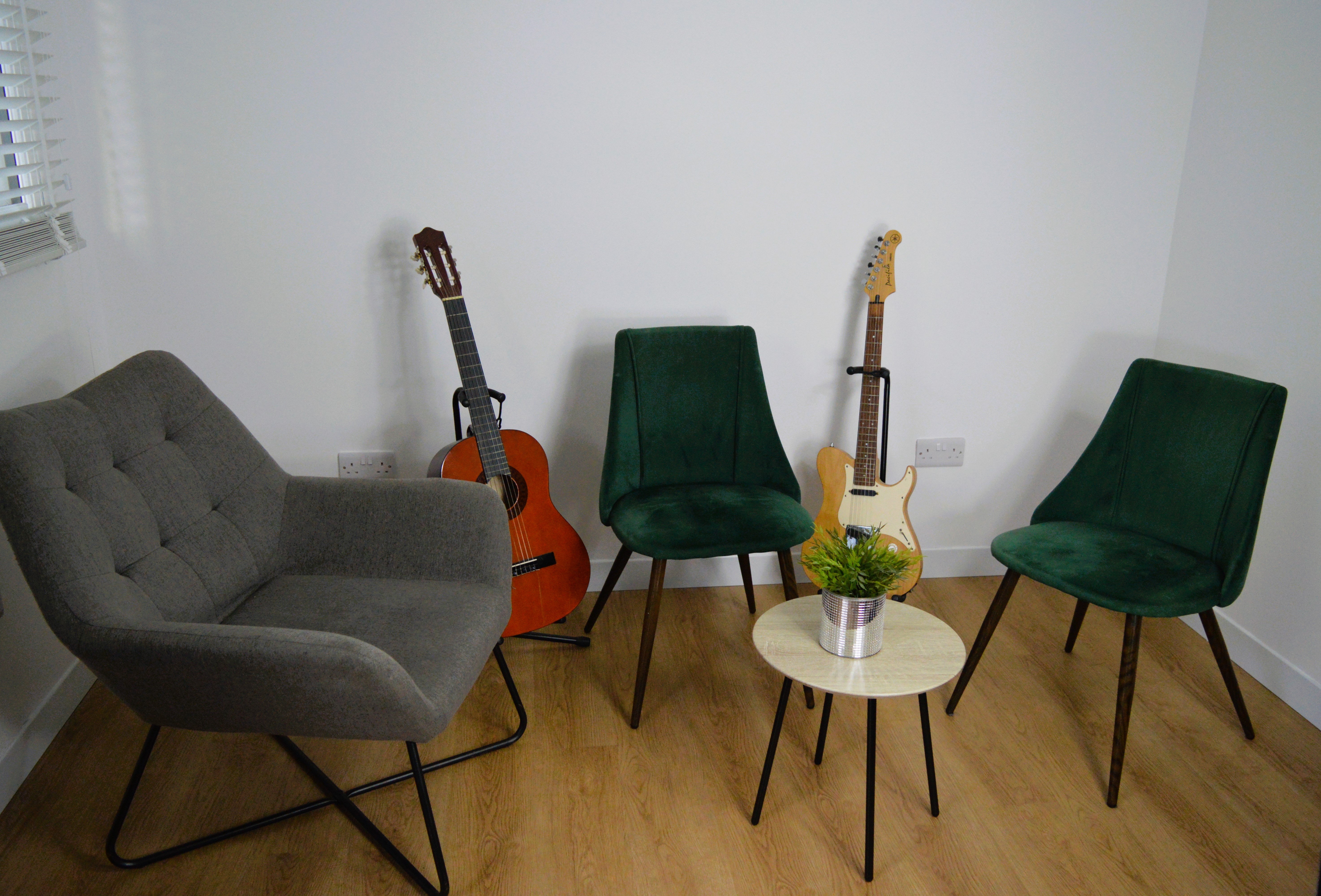 Three chairs in the studio corner