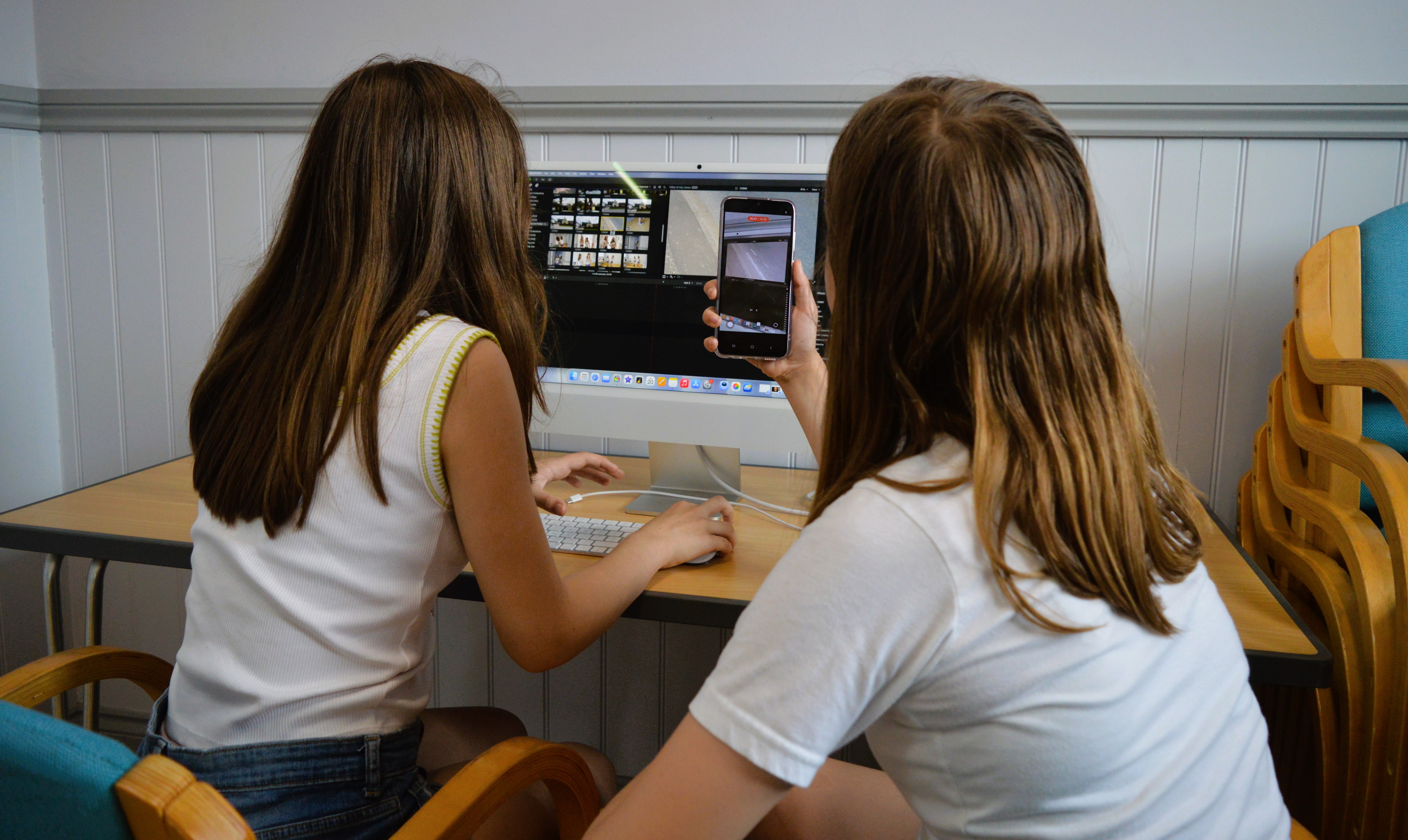 Offshoot Foundation participant working at a computer during a creative session